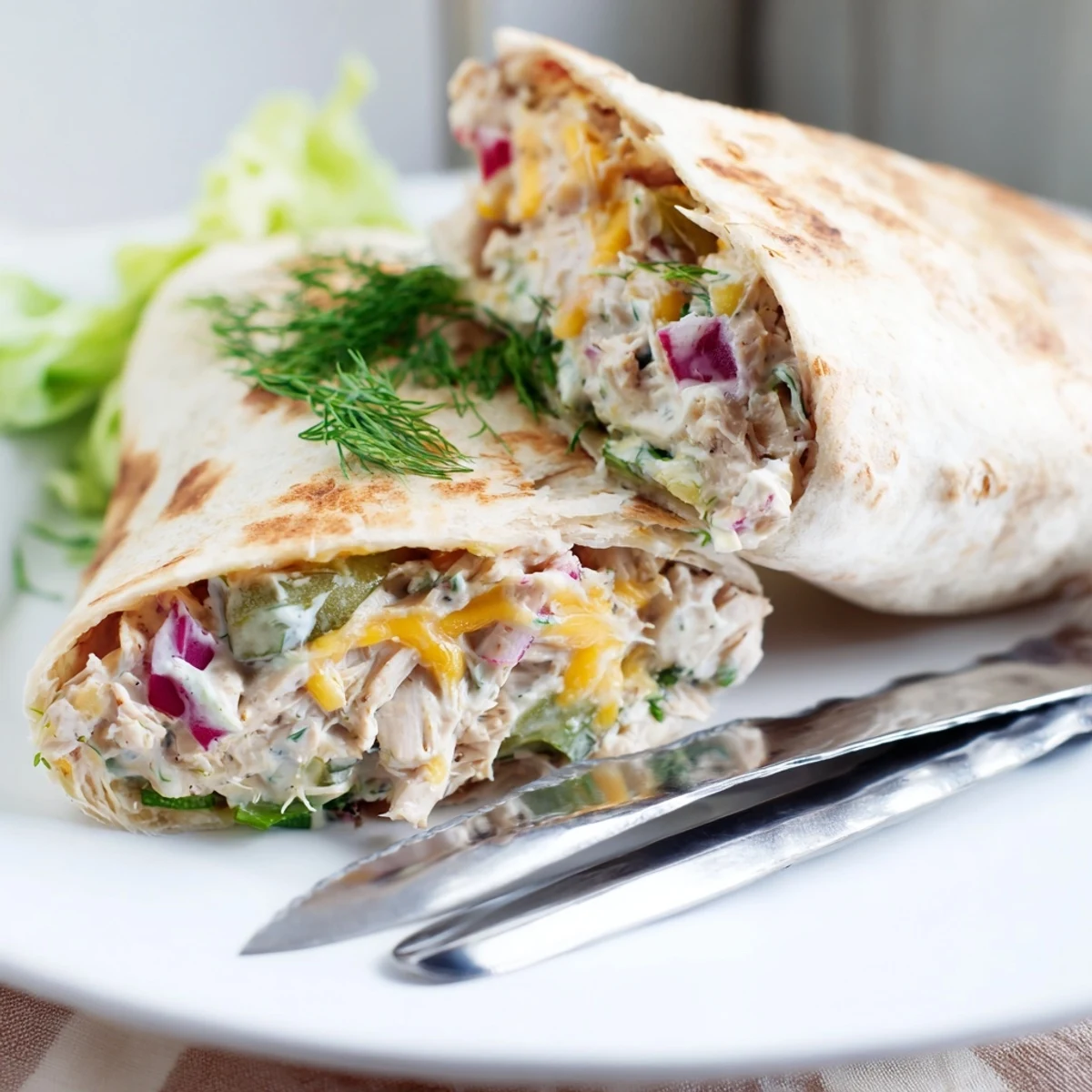Savor Ranch Pickle Chicken Melt Wraps, bursting with tangy pickles and tender chicken.  