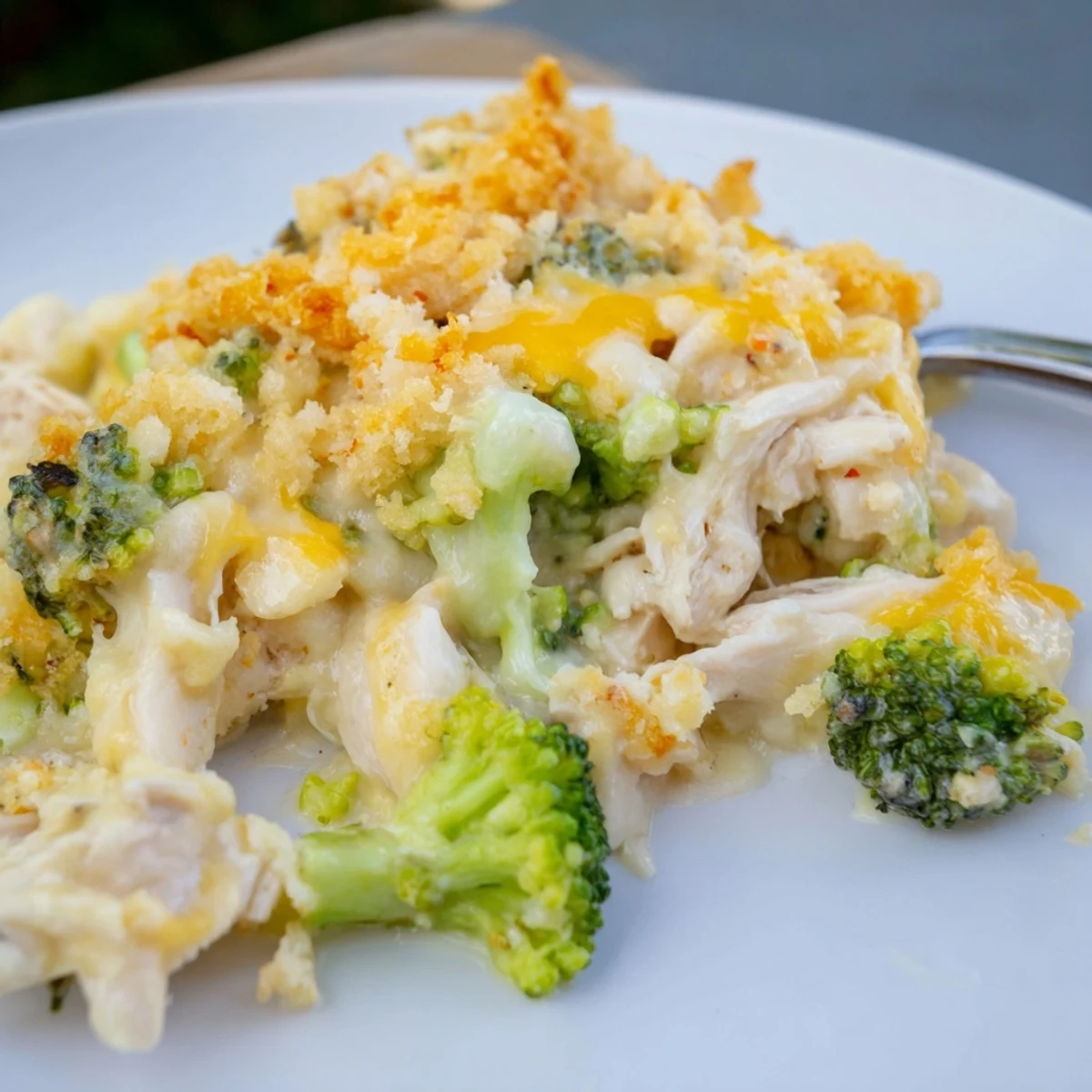Creamy Chicken & Broccoli Cheddar Bake topped with crispy breadcrumbs for ultimate comfort.  