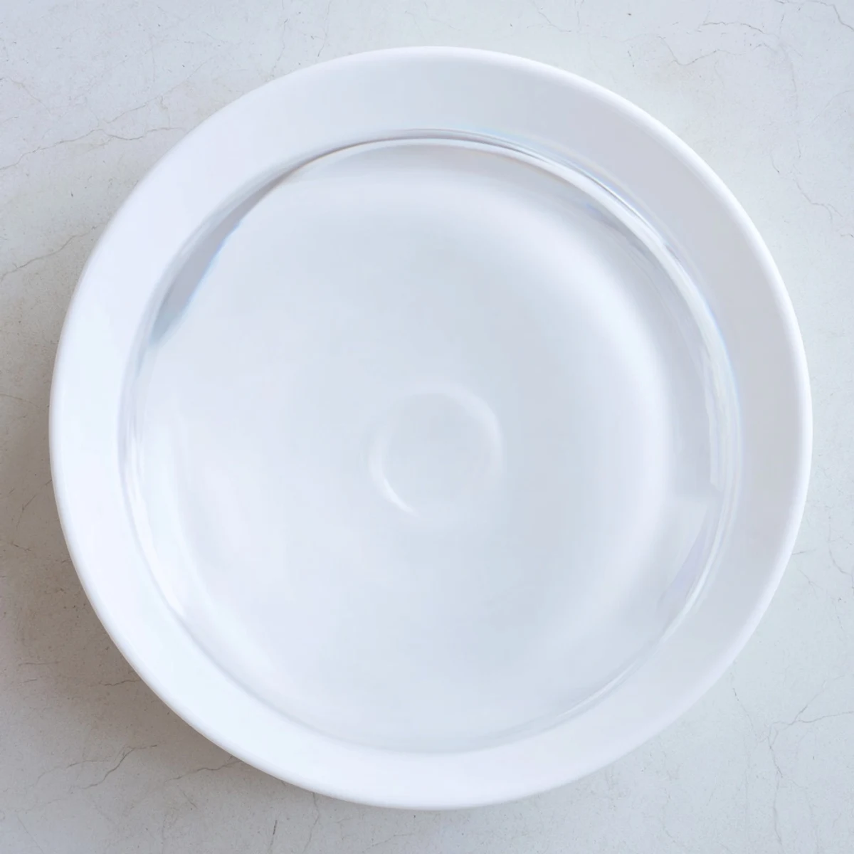 Refreshing water pouring into a tall glass, perfect for accompanying any meal.  