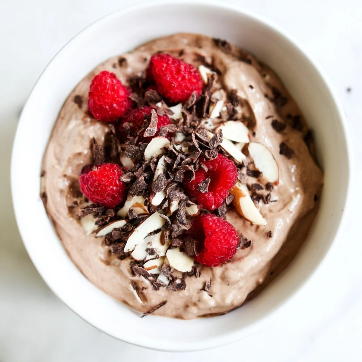 Enjoy thick and chilled No-Bake Cottage Cheese Chocolate Mousse, a quick and delicious dessert option.