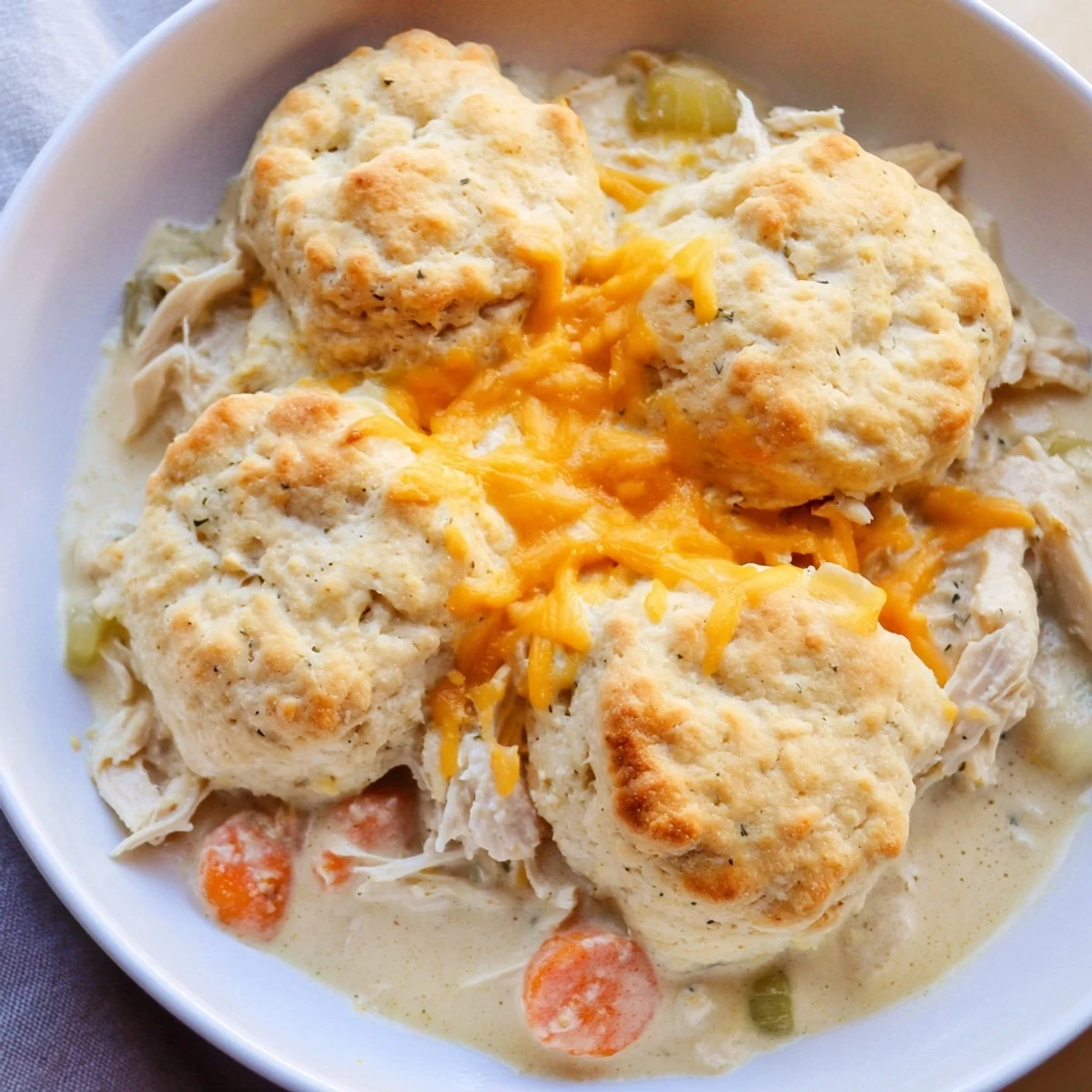 Golden, bubbly One-Pan Chicken Cobbler with cheesy biscuits and creamy chicken filling.