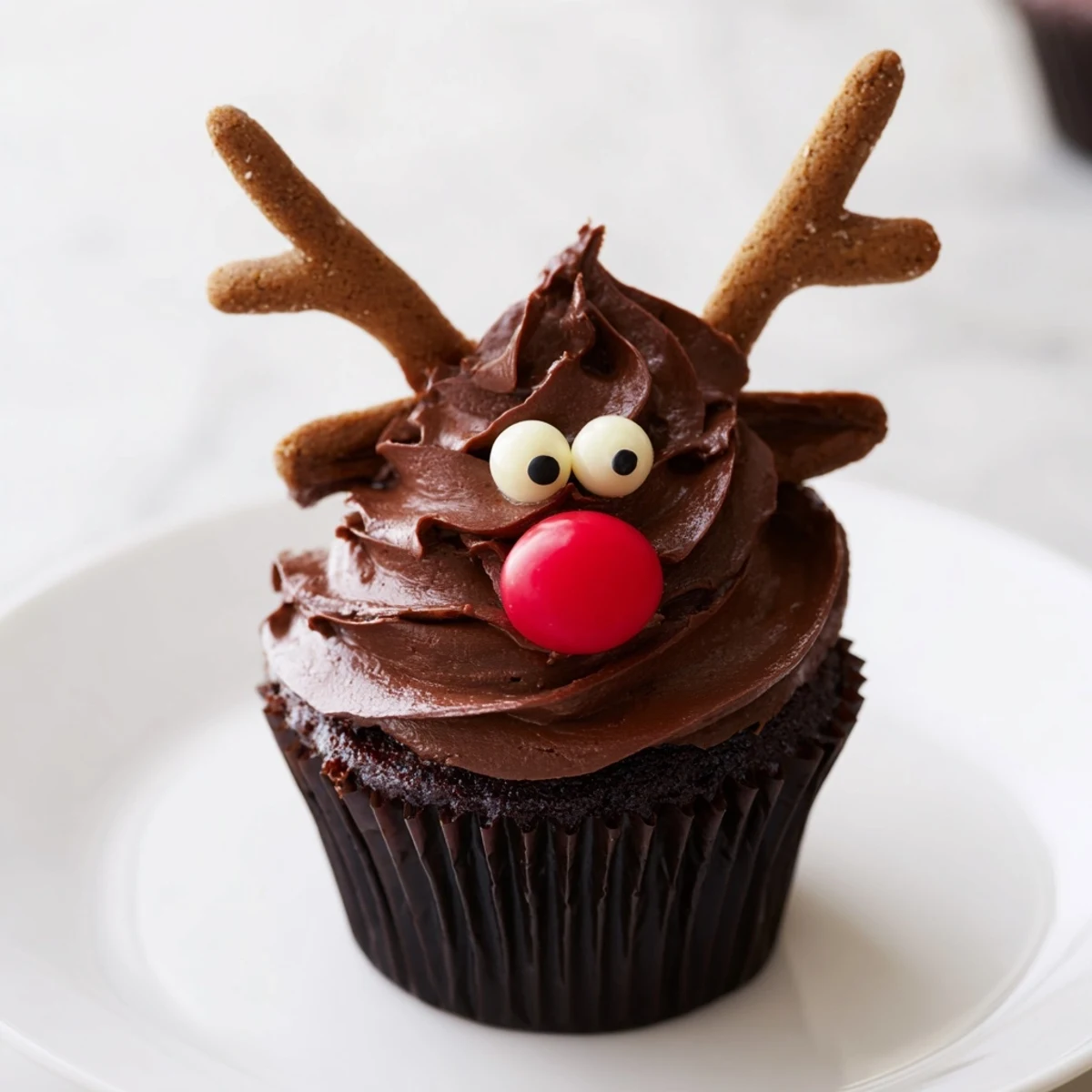 This Reindeer Holiday Dessert Platter features delicious reindeer cupcakes, ideal for any holiday gathering.