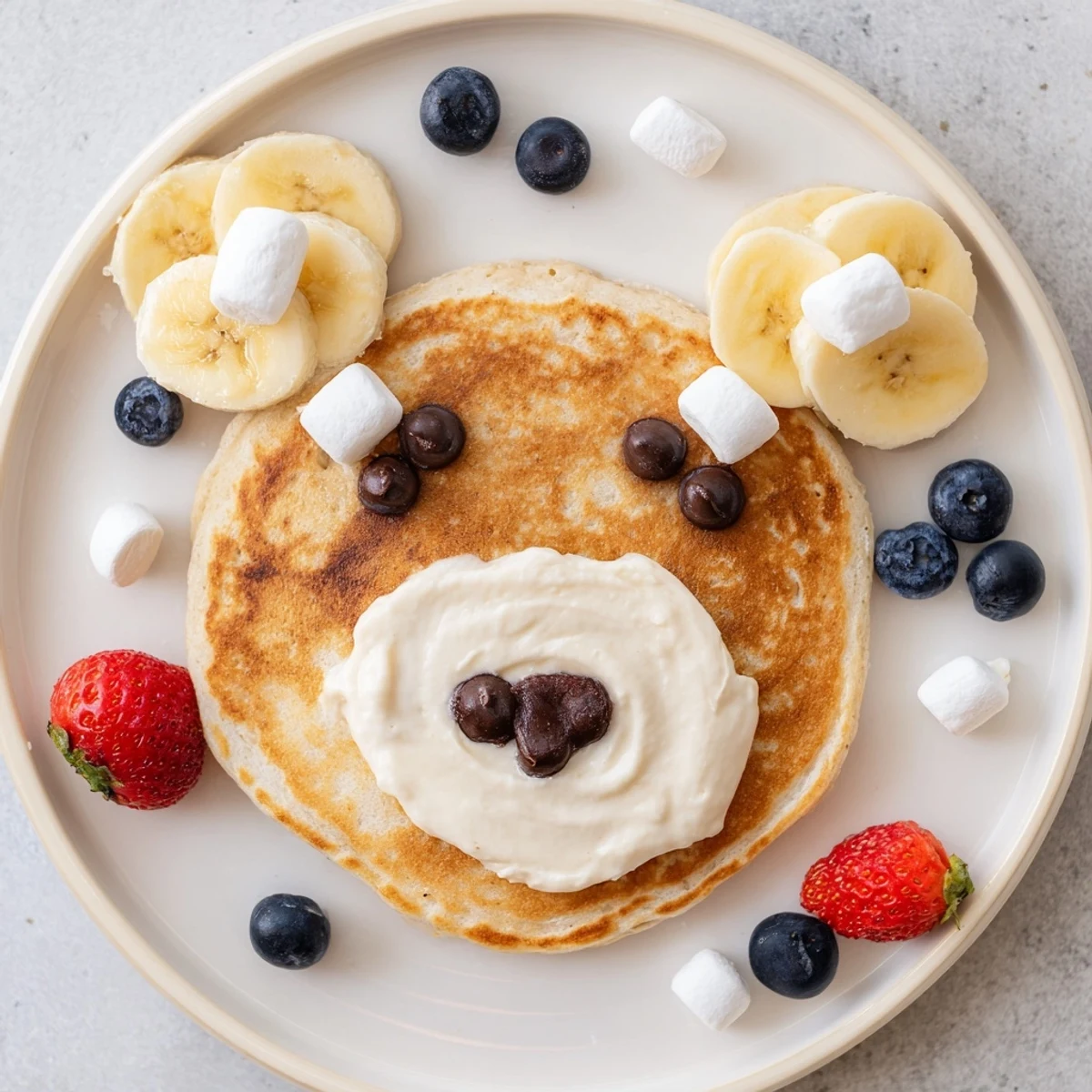 Fluffy Polar Bear Pancake Stack Board with fresh berries and chocolate hazelnut spread, delicious brunch.