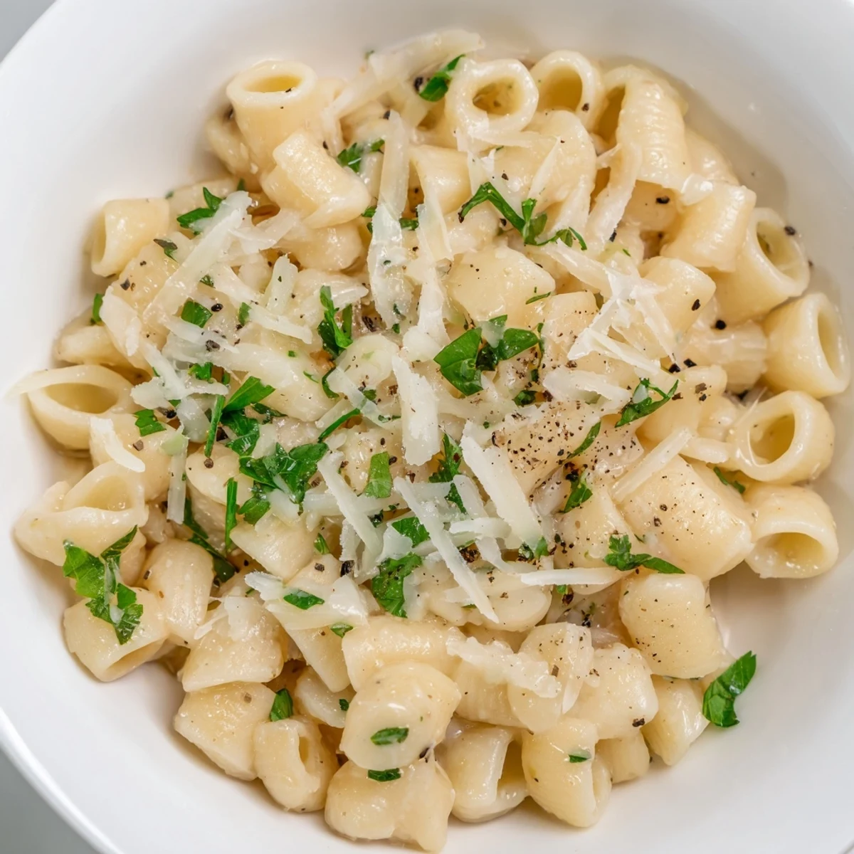 Freshly garnished one-pot garlic butter ditalini, a fast weeknight dinner ready in under 20 minutes.