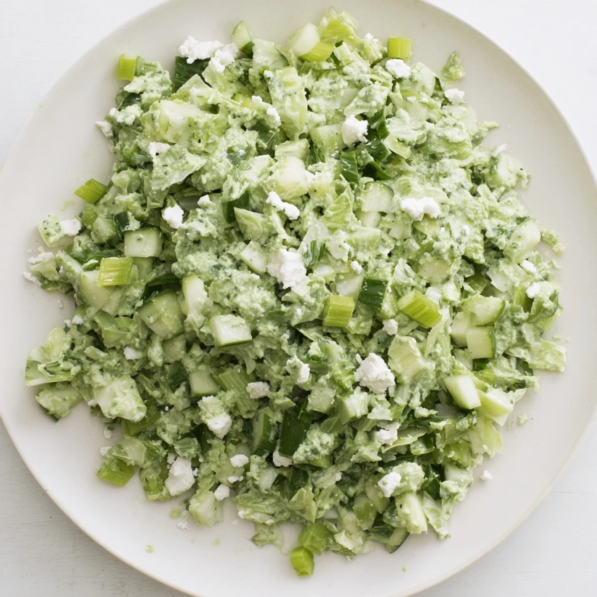 Creamy, vibrant Green Goddess Cabbage Dip, fresh and ready to scoop with crunchy tortilla chips.