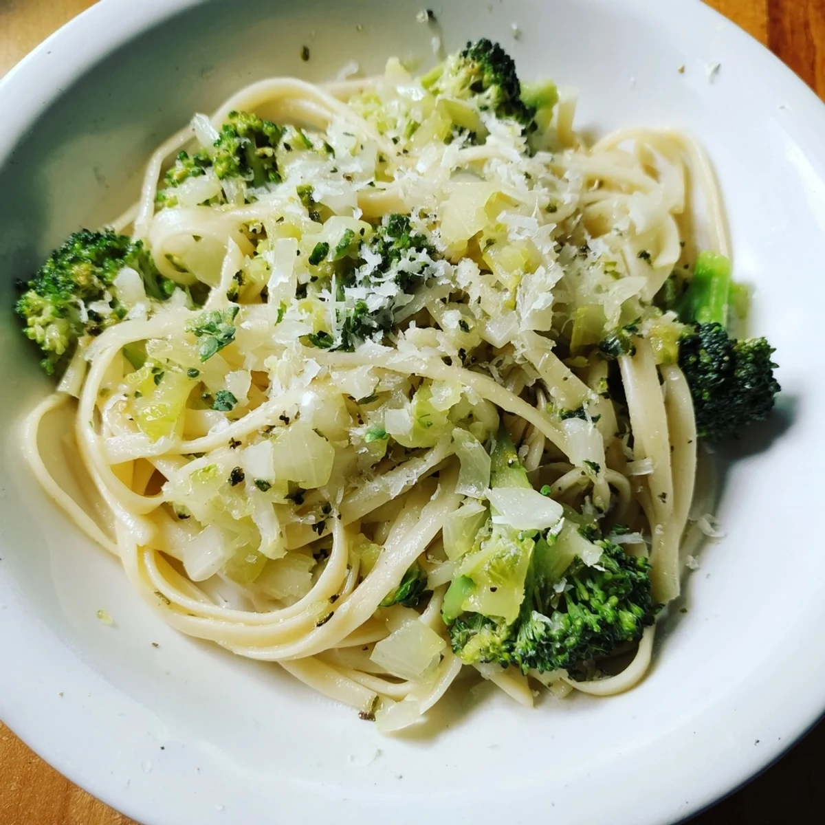 Steaming bowl of One-Pot Lemon Broccoli Pasta, with tender broccoli and bright lemon zest swirling.