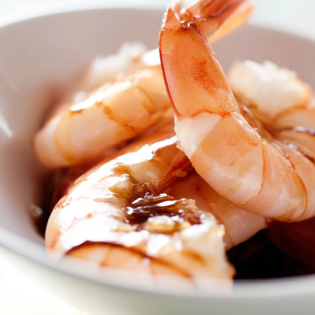 Succulent sautéed shrimp and fluffy quinoa form the base of this vibrant detox Buddha bowl, topped with crisp broccoli and creamy avocado slices.