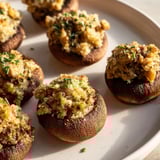 Warm, cheesy, and inviting, these delicious Enchanted Forest Mushroom Nibbles are ready to eat.
