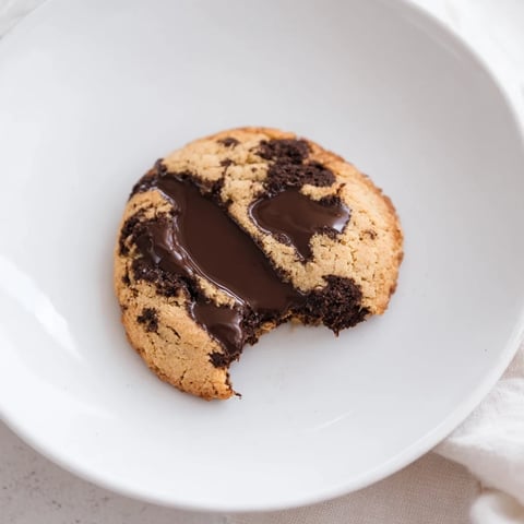 Air-Fryer Chocolate Chip Cookies, warm and soft, ready to enjoy with a glass of cold milk.