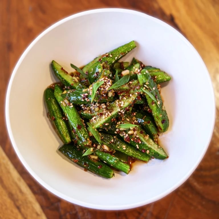 Close-up of a refreshing Tangy Shaken Asian-Style Cucumber Salad, perfect as a quick, flavorful side dish.